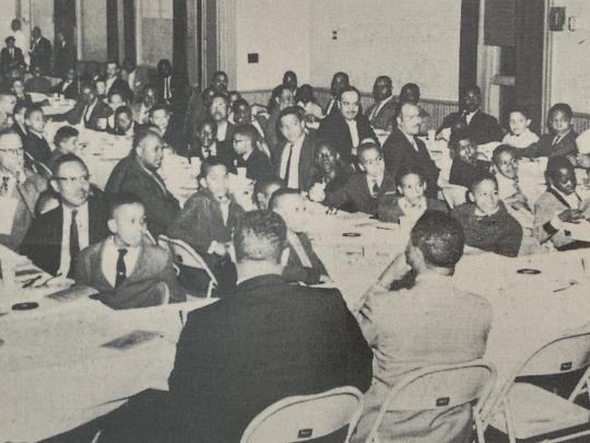 Fathers and sons pictured at a banquet in 1960
