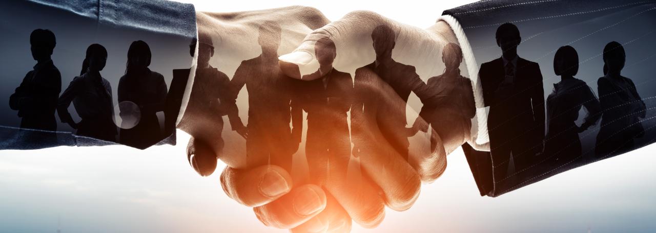 Image of two hands shaking with silhouettes superimposed on the arms and hands