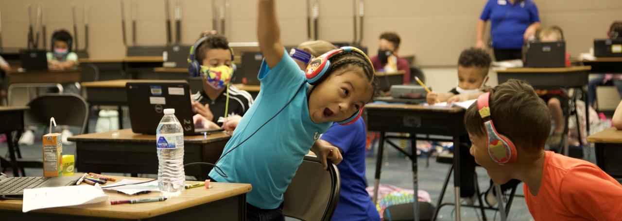 Students celebrate a correct answer in the YMCA's Student Success Center