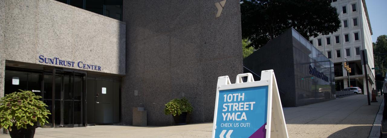 Sandwich board sign of 10th Street YMCA entrance