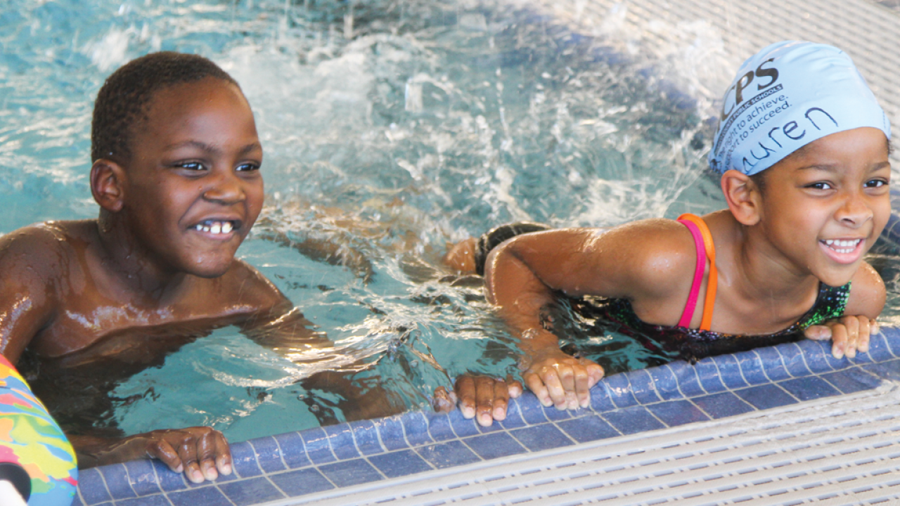 Aquatics Hero Image Two youth swimmers at FRANK J THORNTON YMCA AQUATIC CENTER