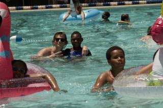 children in pool time at summer camp