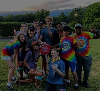 teens.jpg Teens in tie-dye shirts smile for picture
