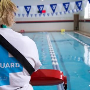 Lifeguard A lifeguard watching a pool
